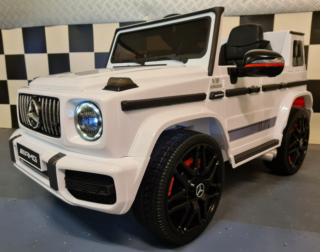 Mercedes G63 kinderauto 12V wit met zachte start voor 1 persoon