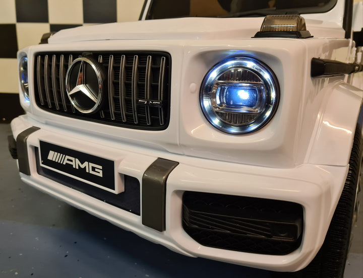 Mercedes G63 kinderauto 12V wit met zachte start voor 1 persoon