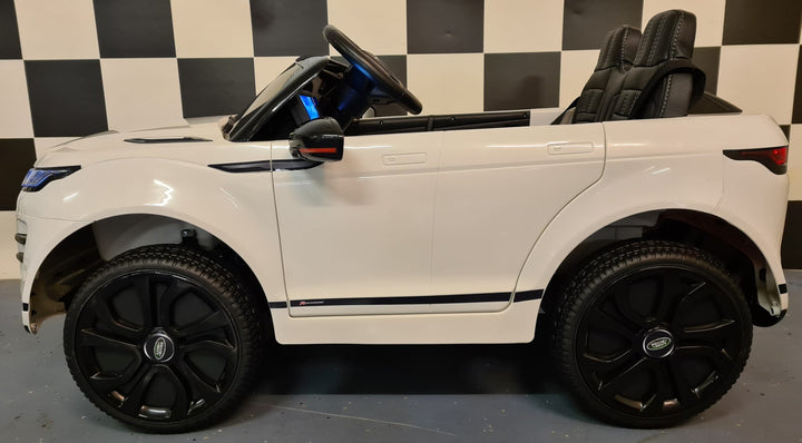 Witte elektrische kinderauto Range Rover Evoque met 4 motoren