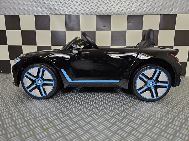 Elektrische kinderauto BMW i4 12 volt zwart