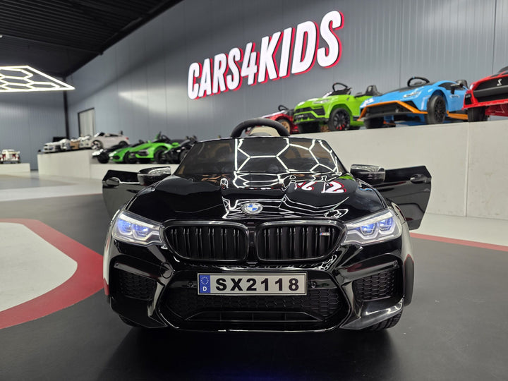 BMW M5 24 volt metallic zwarte kinderauto