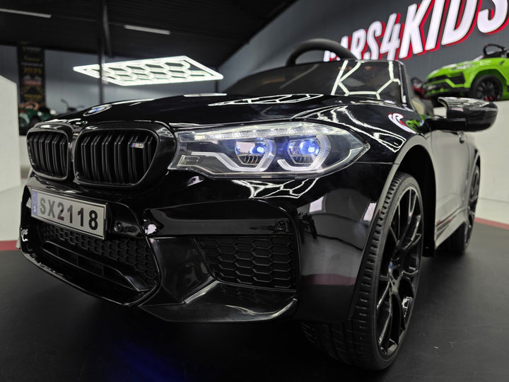 BMW M5 24 volt metallic zwarte kinderauto