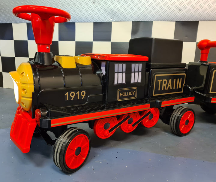 Elektrische kindertrein 12 volt met 2 wagons