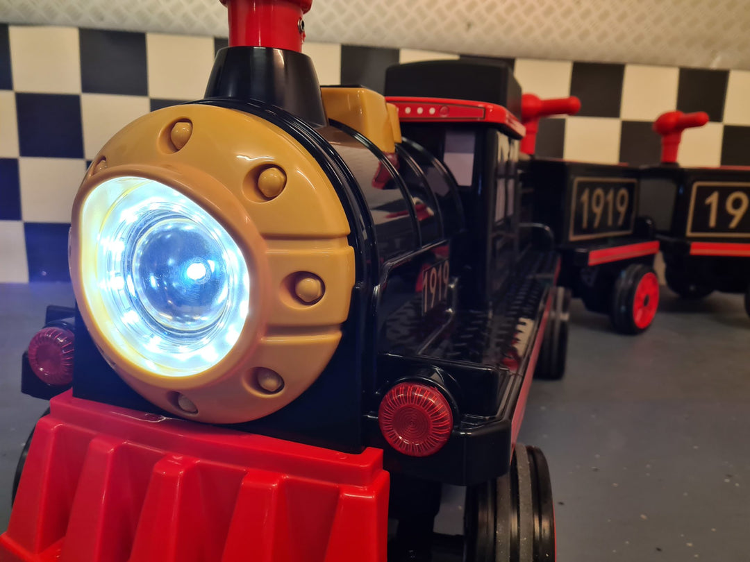 Elektrische kindertrein 12 volt met 2 wagons