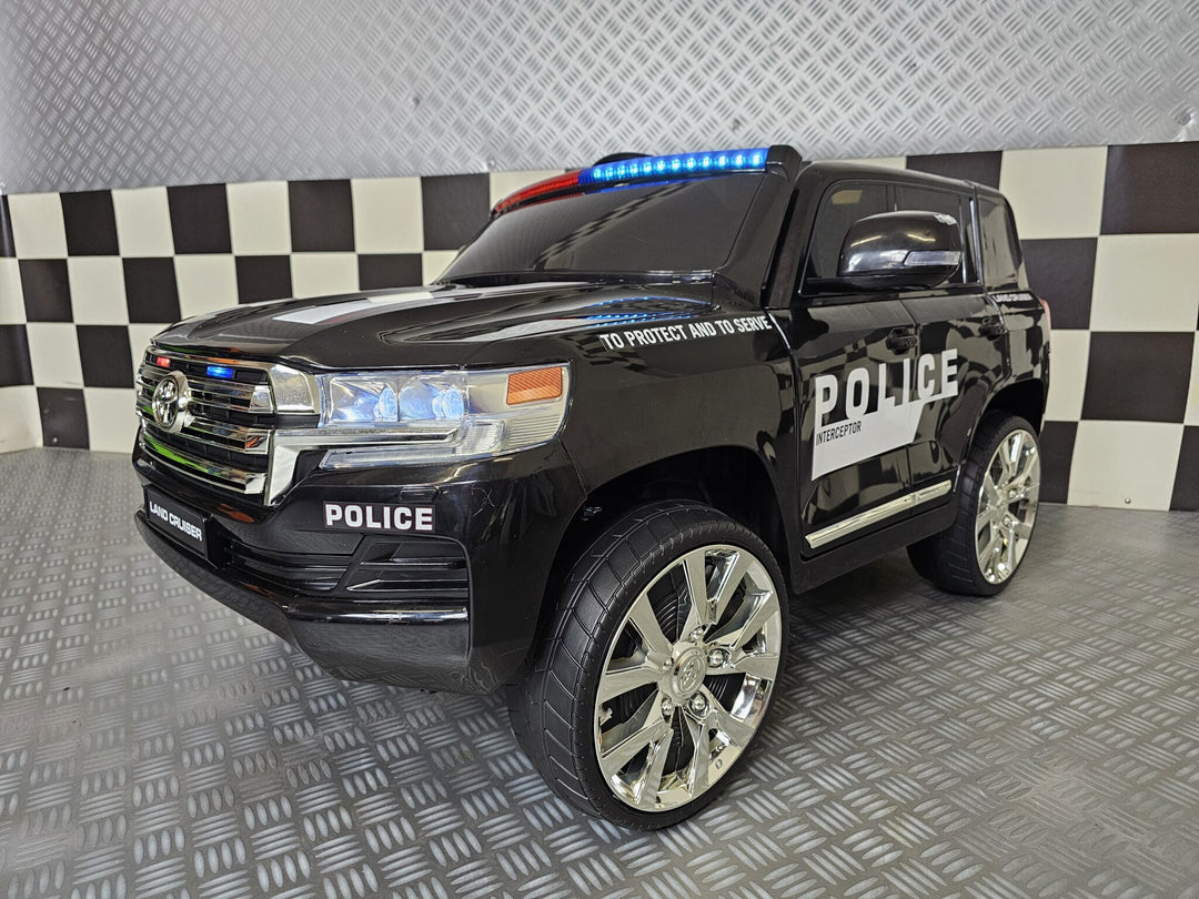 Kinderauto Toyota Land Cruiser politie 24 volt