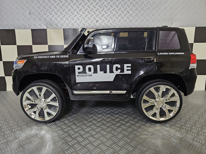 Kinderauto Toyota Land Cruiser politie 24 volt
