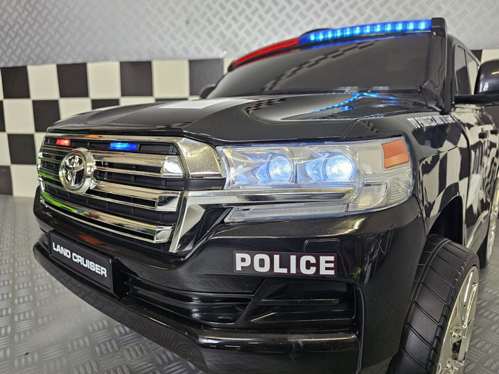 Kinderauto Toyota Land Cruiser politie 24 volt