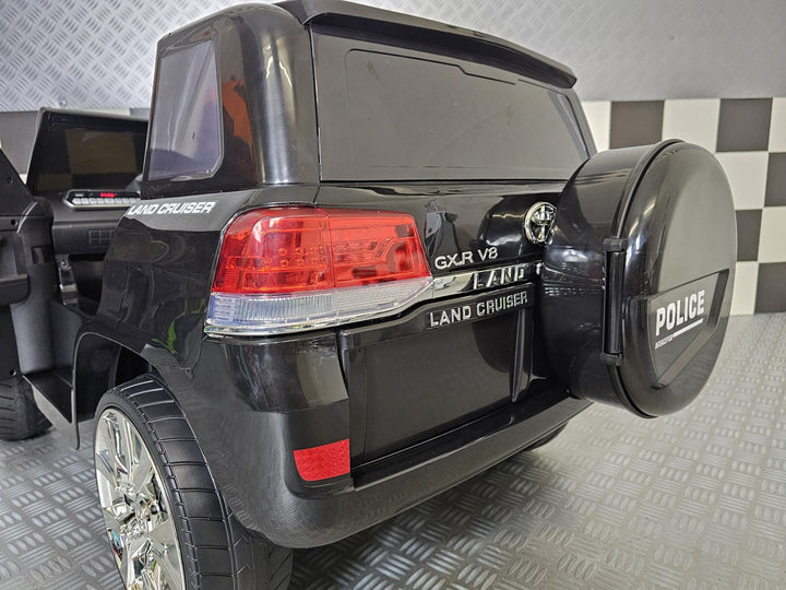 Kinderauto Toyota Land Cruiser politie 24 volt
