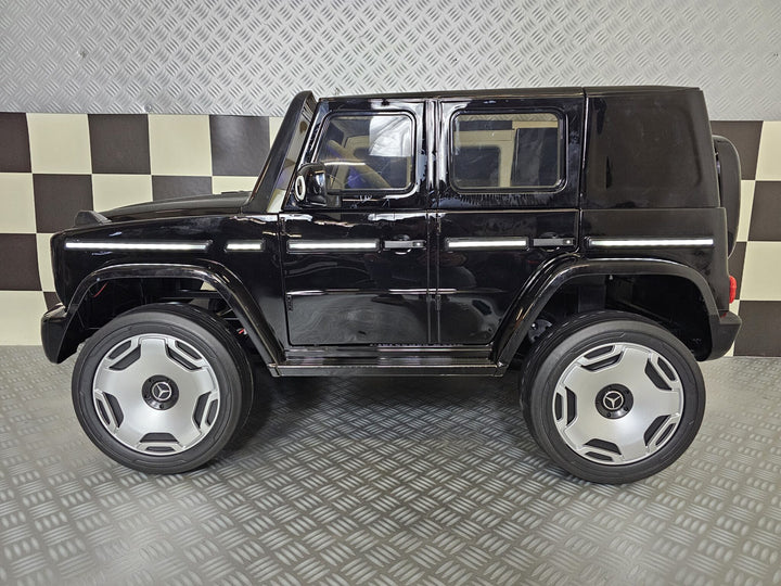 Kinderauto Mercedes EQG zwart 12 volt