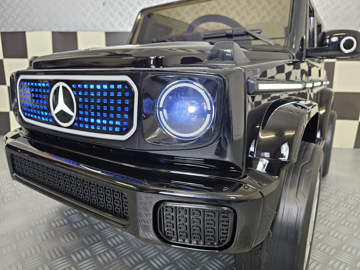 Kinderauto Mercedes EQG zwart 12 volt