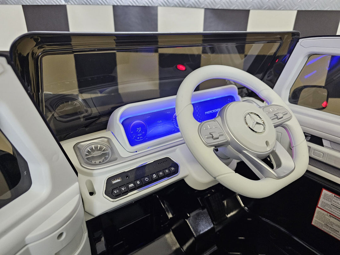 Kinderauto Mercedes EQG zwart 12 volt