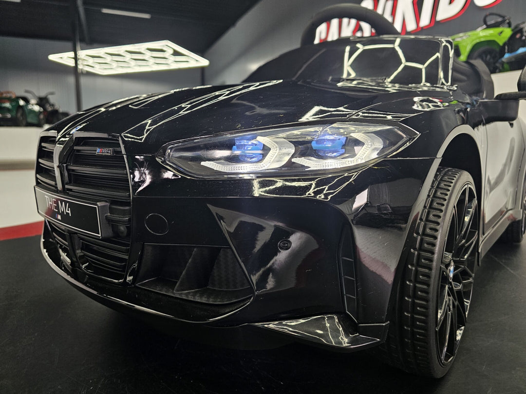 Elektrische kinderauto BMW M4 12 volt metallic zwart