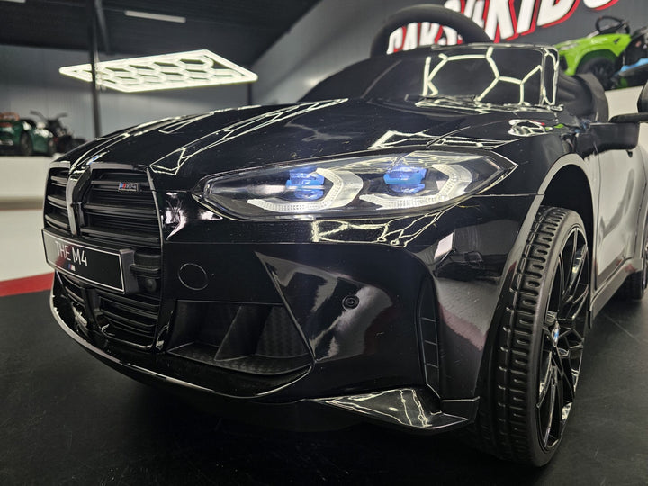 Elektrische kinderauto BMW M4 12 volt metallic zwart