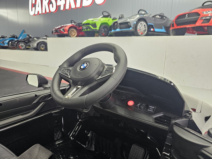 Elektrische kinderauto BMW M4 12 volt metallic zwart