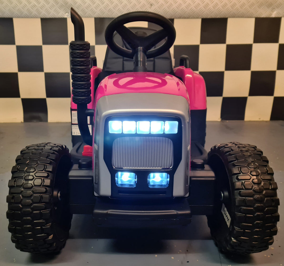 Roze kindertractor 12 volt met aanhanger
