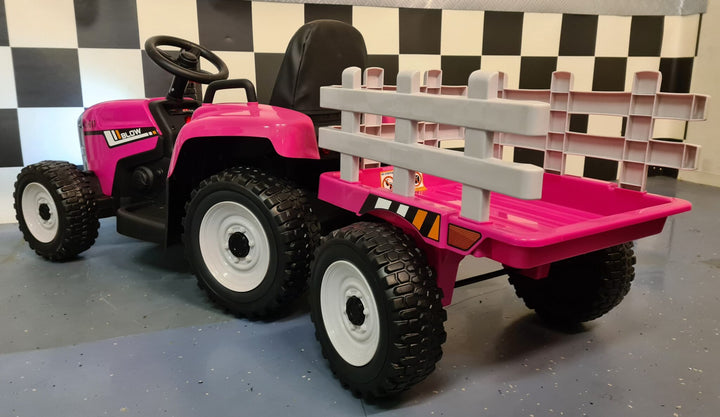 Roze kindertractor 12 volt met aanhanger