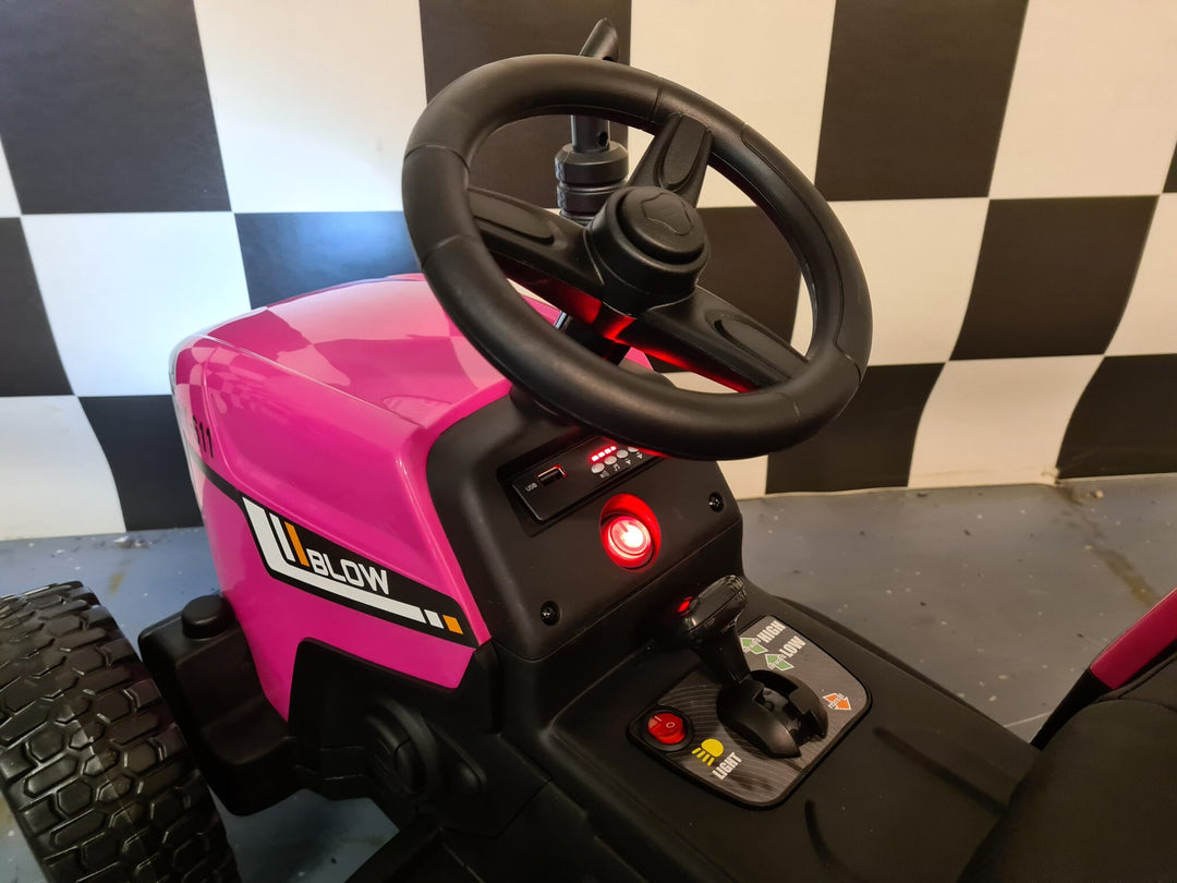 Roze kindertractor 12 volt met aanhanger