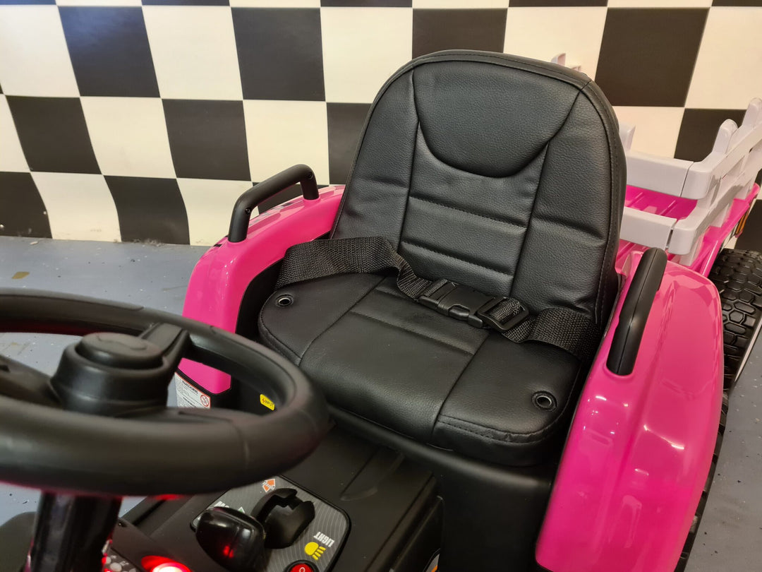 Roze kindertractor 12 volt met aanhanger